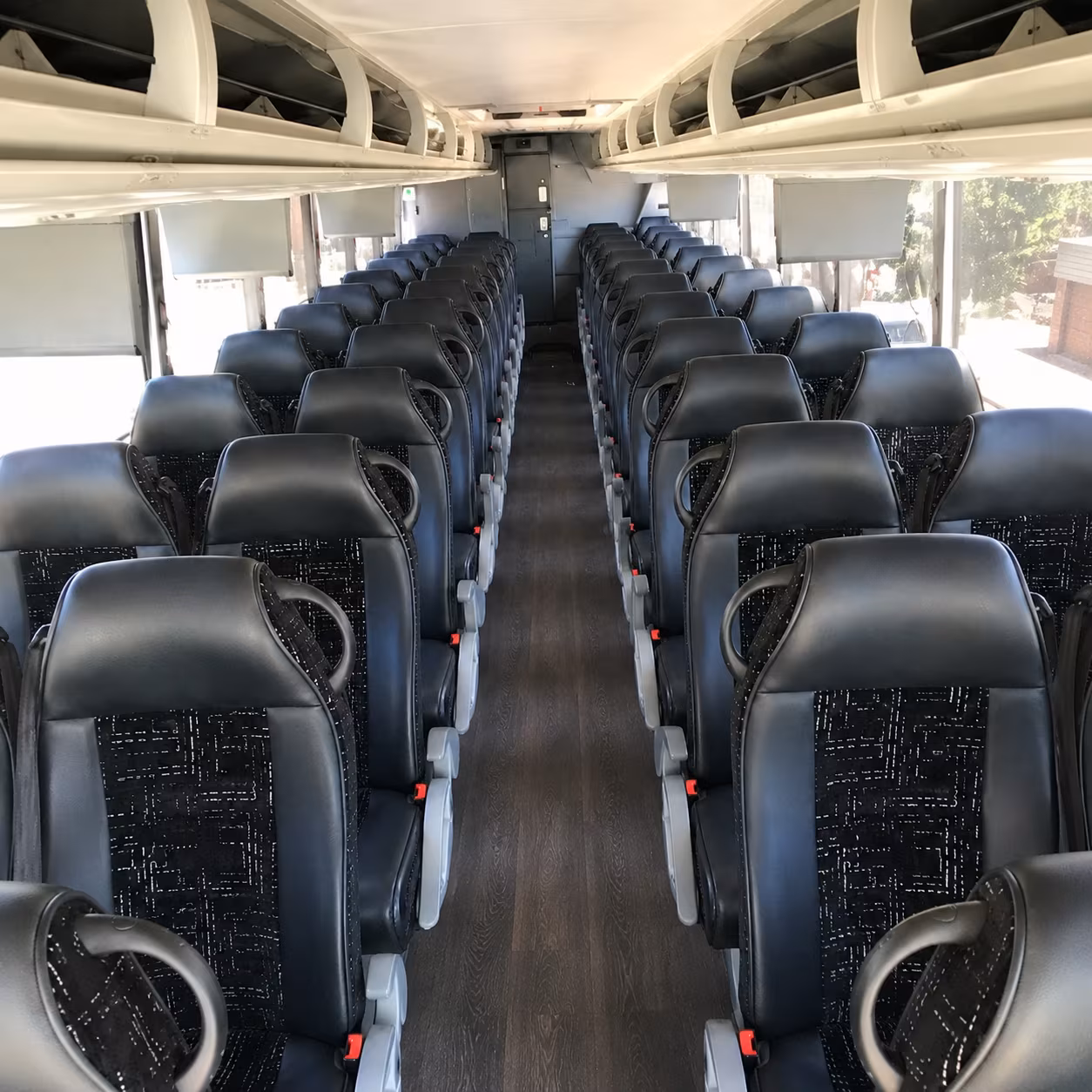 how distance and duration affect charter bus rates in grand rapids