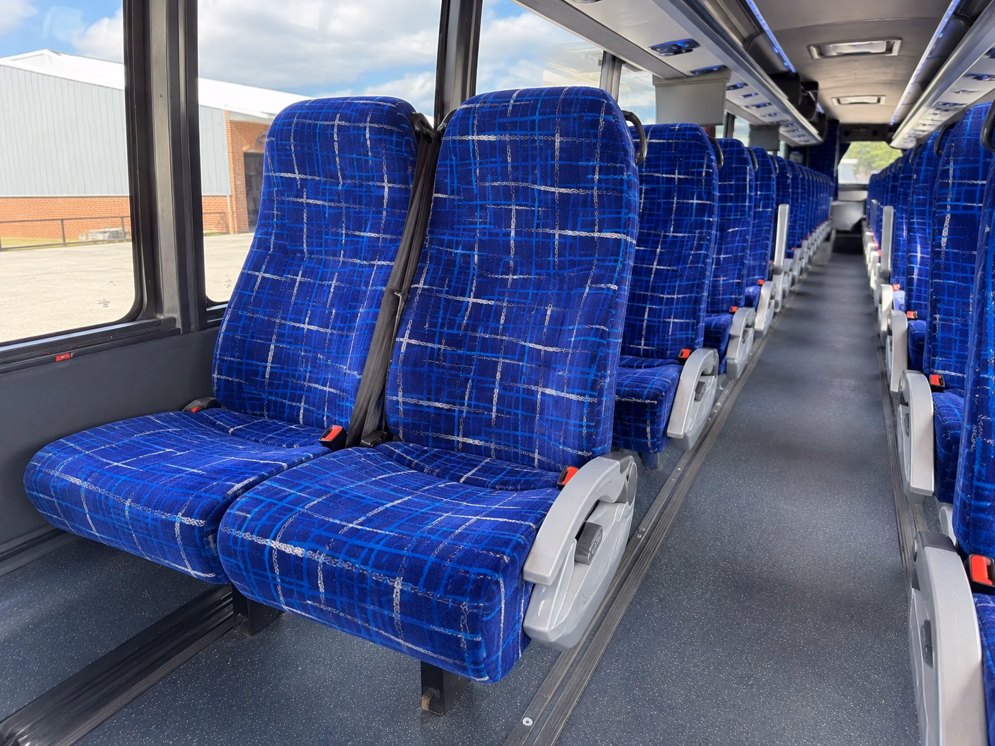 how starting location and deadhead affect charter bus rates in grand rapids